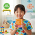 Happy child holding Purest Kids Omega-3 Mango Burstlets — kids approved, 90-day money-back guarantee